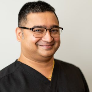 Dr. Ajay Das headshot, experienced general dentist in Hammond, IN